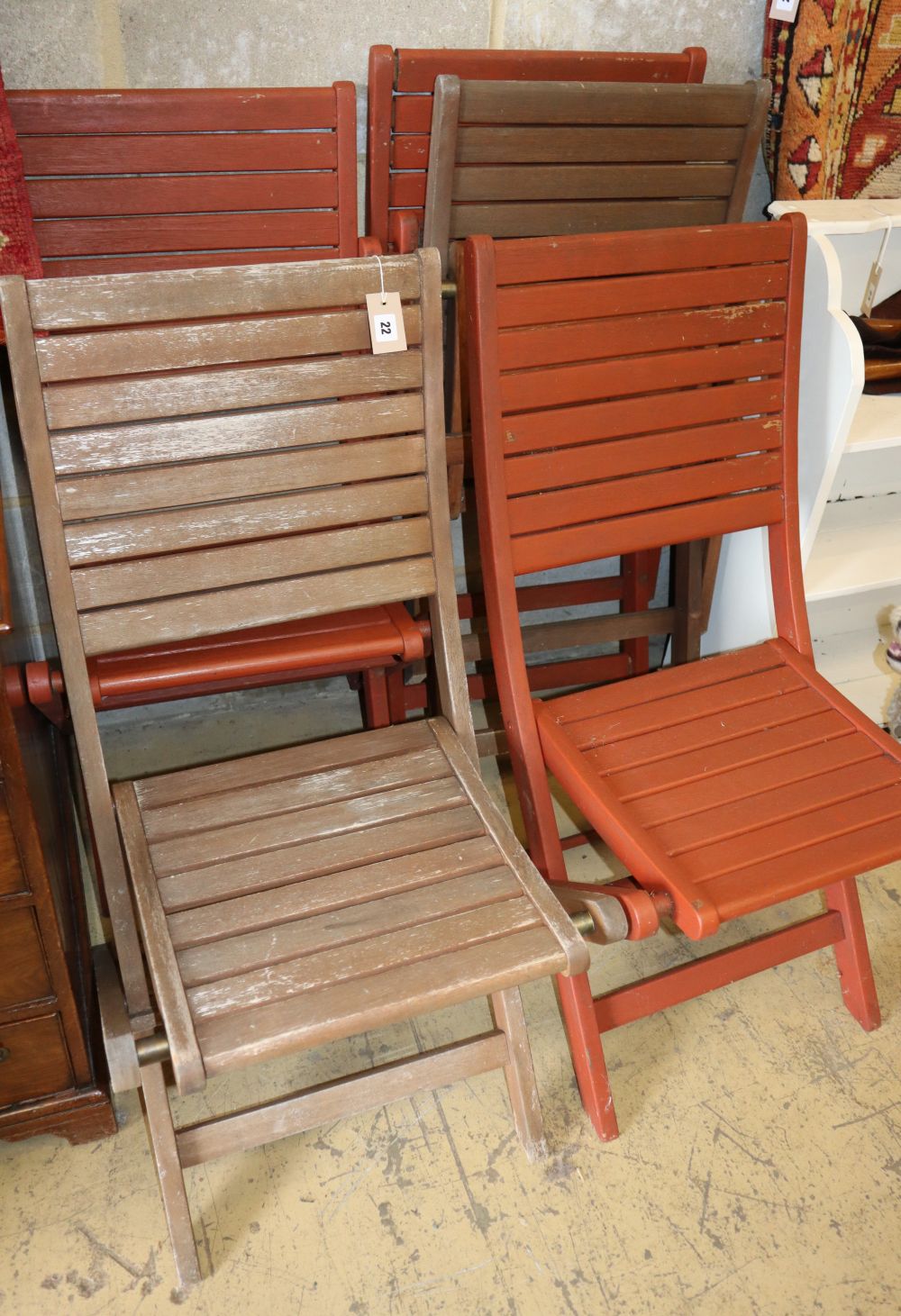 Five teak folding garden chairs